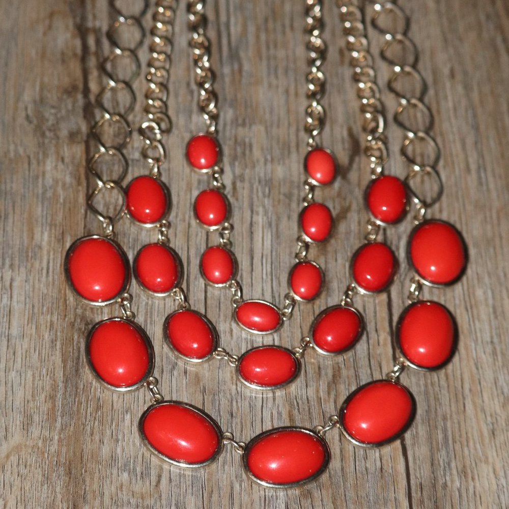 THREE TIERED SILVER/REDDISH ORANGE NECKLACE